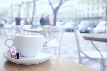 cup of coffee for breakfast in a cafe / serving cup of coffee in modern interior, a European breakfast