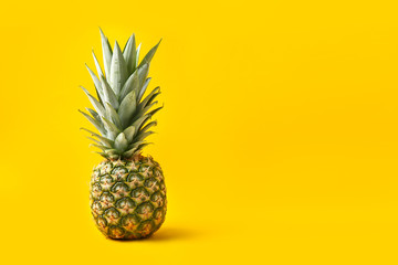 Ripe pineapple on color background