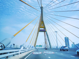 Obraz premium Poochaosamingprai, Samut Prakarn / Thailand - May 10, 2019: Bhumibol 2 Suspension Bridge with Name Labeled in Thai