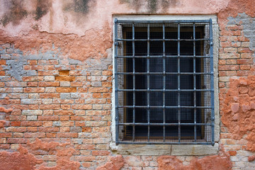 Old window with iron gate