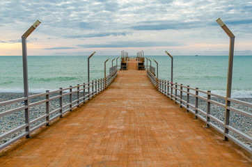 Fototapeta premium deserted sea pier. seascape. rusty pier