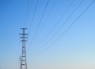 Hight-voltage electric power lines at sunset.