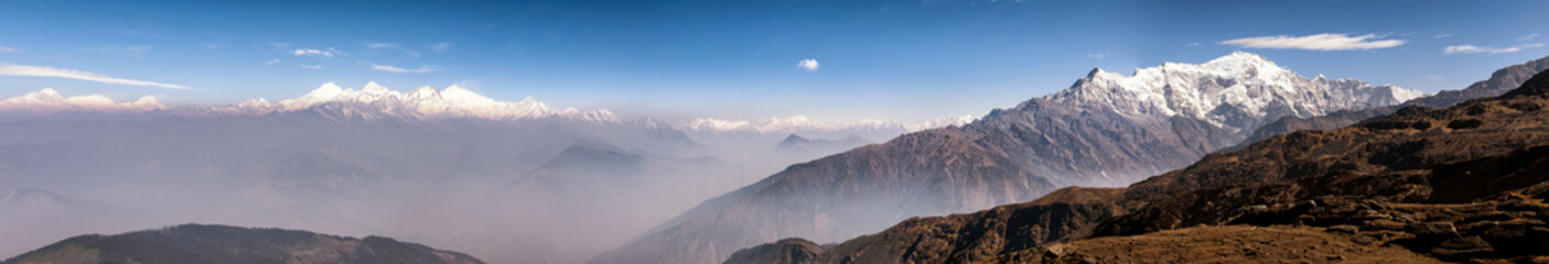 Panoramic view on the way to the gosaikunda lake. See the various peaks along the Himalayas. In the hot season, the weather is cool but sunny