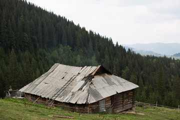 Old wooden house on mountain hill
