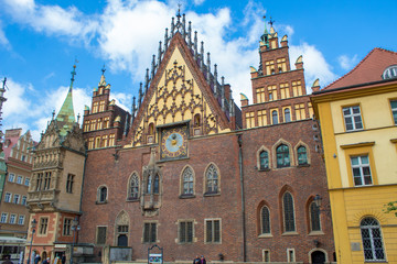 Fototapeta na wymiar The colorful architecture of the famous Polish city of Wroclaw - Market Square, Town Hall.
