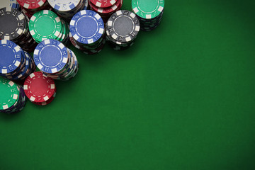 Poker chips on blue background