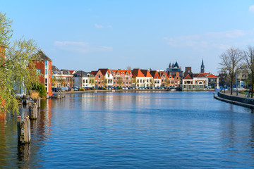 Fototapeta na wymiar Haarlem, Netherlands – April 14, 2019: Haarlem canals and architecture, Netherlands