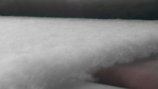 Rolled polyester batting on a factory line.