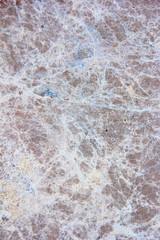 brown stone or mwith cracks and patternsarble wall a texture