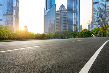 Shanghai modern commercial office buildings and empty asphalt highway