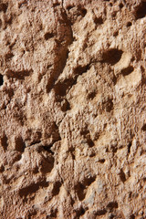 brown stone or mwith cracks and patternsarble wall a texture