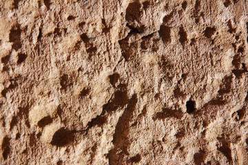 brown stone or mwith cracks and patternsarble wall a texture