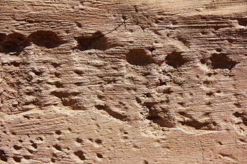 brown stone or mwith cracks and patternsarble wall a texture