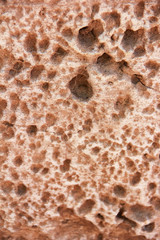 brown stone or mwith cracks and patternsarble wall a texture