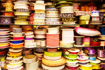 Colored ribbons. Tool for needlework.