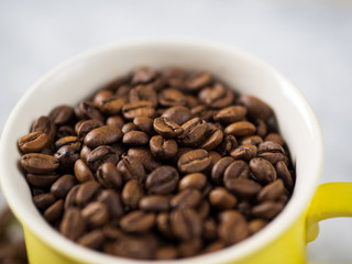 Close-up of coffee bean in Cup