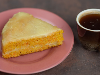 Homemade carrot cake and a Cup of coffee