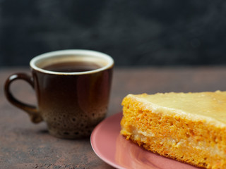 Homemade carrot cake and a Cup of coffee