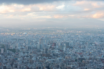 Fototapeta na wymiar Sapporo city skyline view from Mount Moiwa. Sapporo, Hokkaido, Japan