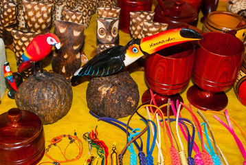 Souvenirs in the Amazon rainforest made from local nuts and animals near Iquitos. Market for...