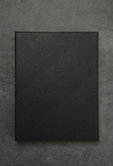 Black note pad, diary, ring binder
