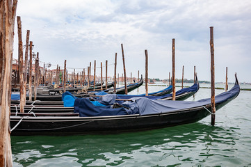 Fototapeta na wymiar Parking gondolas in Venice.