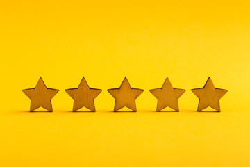 Five stars on yellow background
