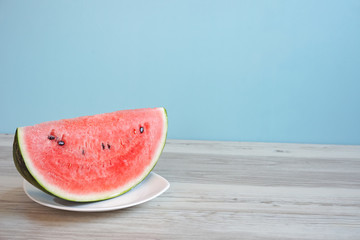Watermelon on the table. Watermelon on a plate. テーブルの上のスイカ。皿の上のスイカ。