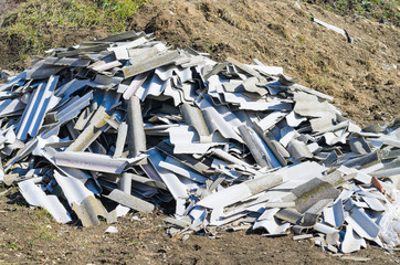 Broken asbestos roof, asbestos removal