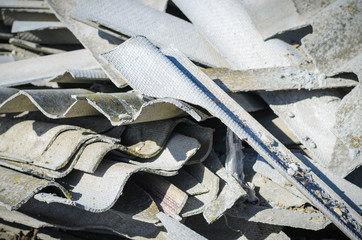 Broken asbestos roof, asbestos removal