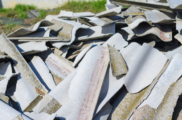 Broken asbestos roof, asbestos removal