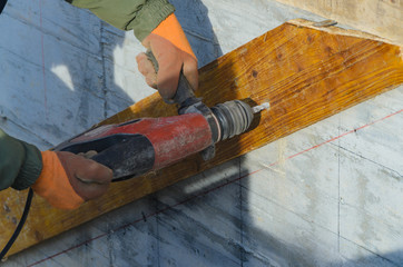 Construction worker, stairs formwork on construction site