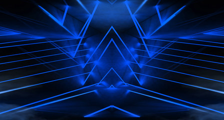 Obraz premium Tunnel in blue neon light, underground passage. Abstract blue background. Background of an empty black corridor with neon light. Abstract background with lines and glow