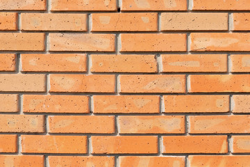 wall of new red brick, natural material, baked clay, close-up