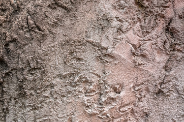 rough stone wall in brown color