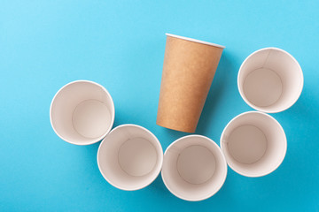 Eco-friendly biodegradable dishes on a blue background