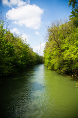 Fototapeta premium View from the Schinderbridge in Munich, Flaucher, Flauchersteg, Isar, Isarauen