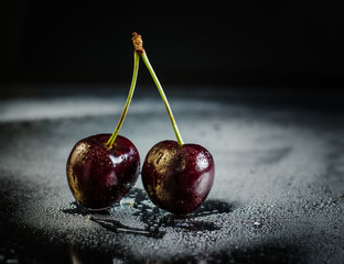 Cherry in a blakc background