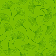 Seamless pattern with ginkgo leaves ornate on green background