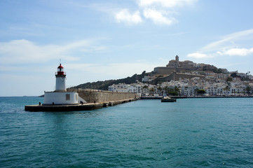 Lighthouse on the pier of Ibiza harbor.