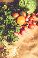 Healthy food background. Assortment of fresh vegetables on paper background