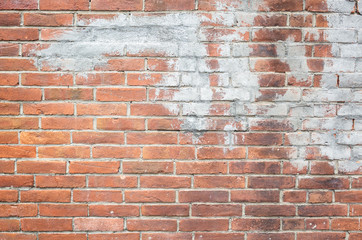 red bricks wall with gray cement