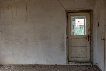 Fototapeta na wymiar old rustic door in building