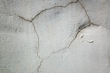 cracked and aged gray wall background