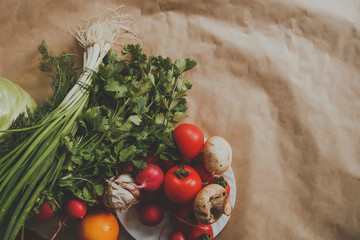 Healthy food background. Assortment of fresh vegetables on paper background