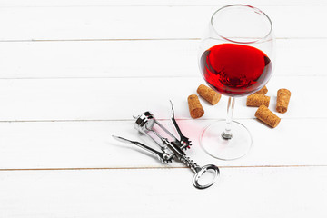 Wine glass on wooden background