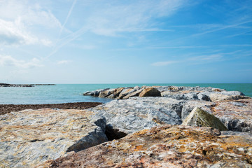 Beautiful azure sea and the rocky beach
