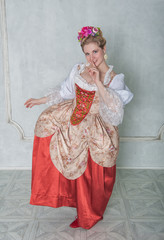 Beautiful woman in old-fashioned historic medieval dress