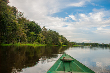 Sail on a wooden boat on the Amazon river in the jungle. Amazon River Manaus, Amazonas, Brazil.