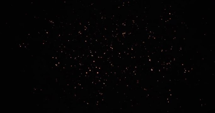 Explosion And Fireballs Burst. Particles Moving Around. 4K VFX Element Black Background